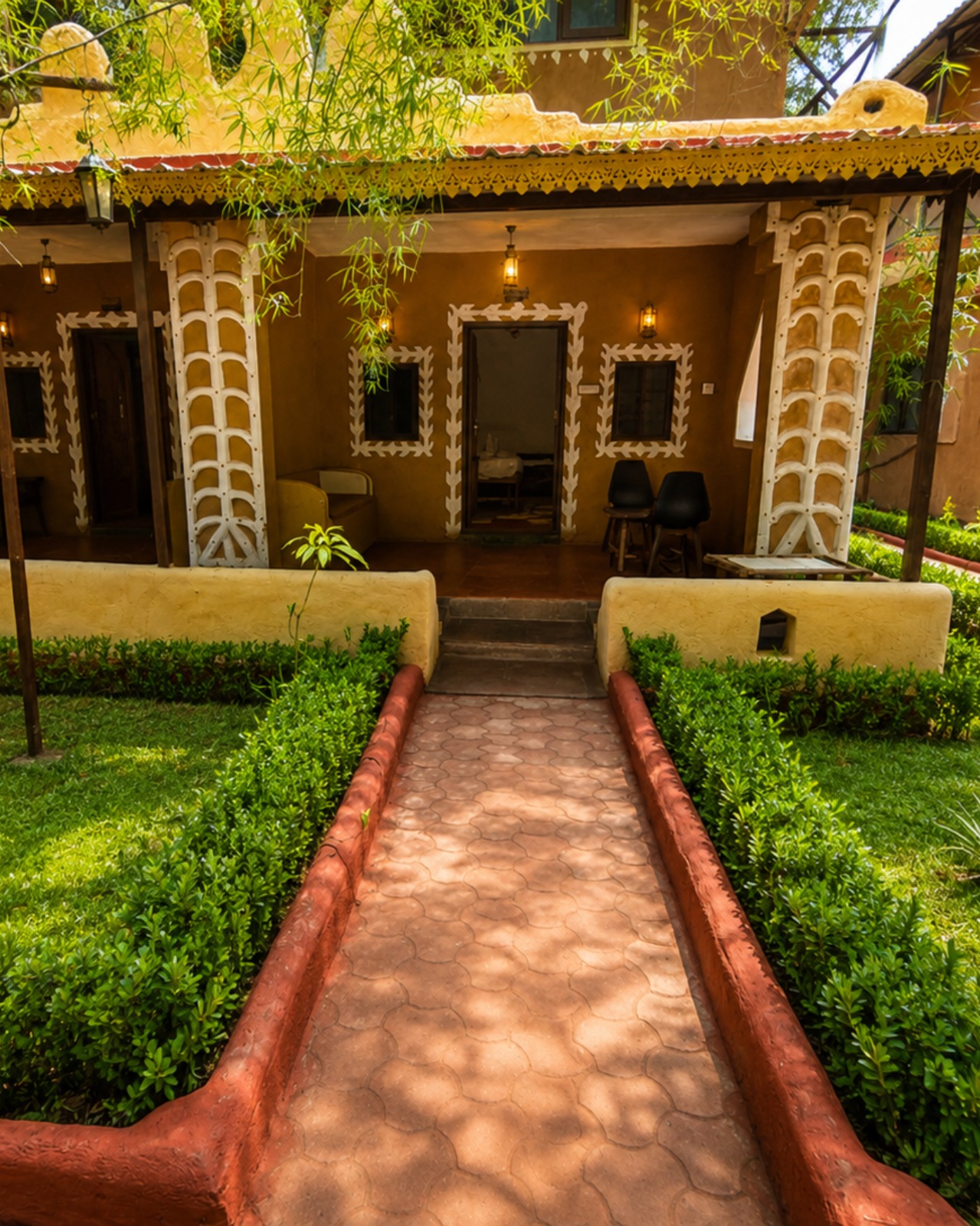 Mahua Tiger Resort Kanha cottage and garden path