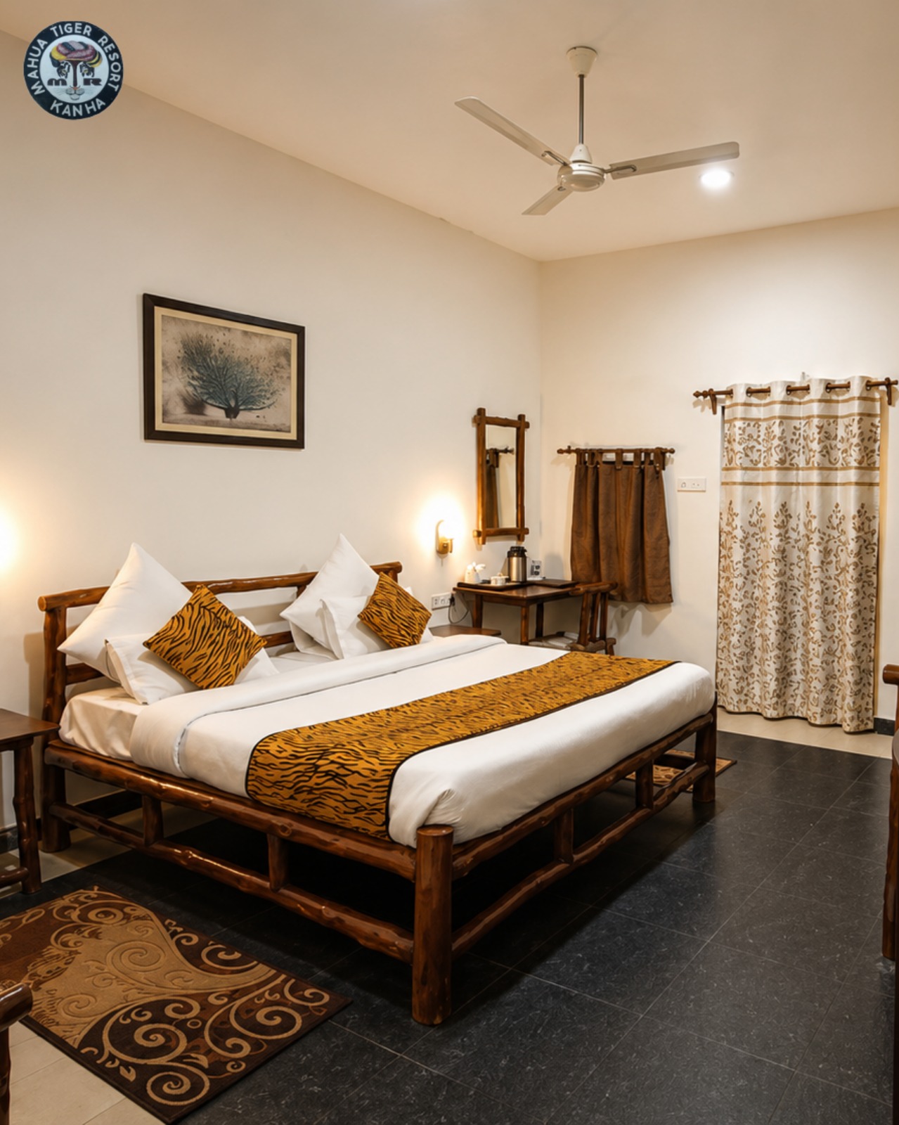 Mahua Tiger Resort Kanha double room with wooden bed and tiger-patterned furnishings