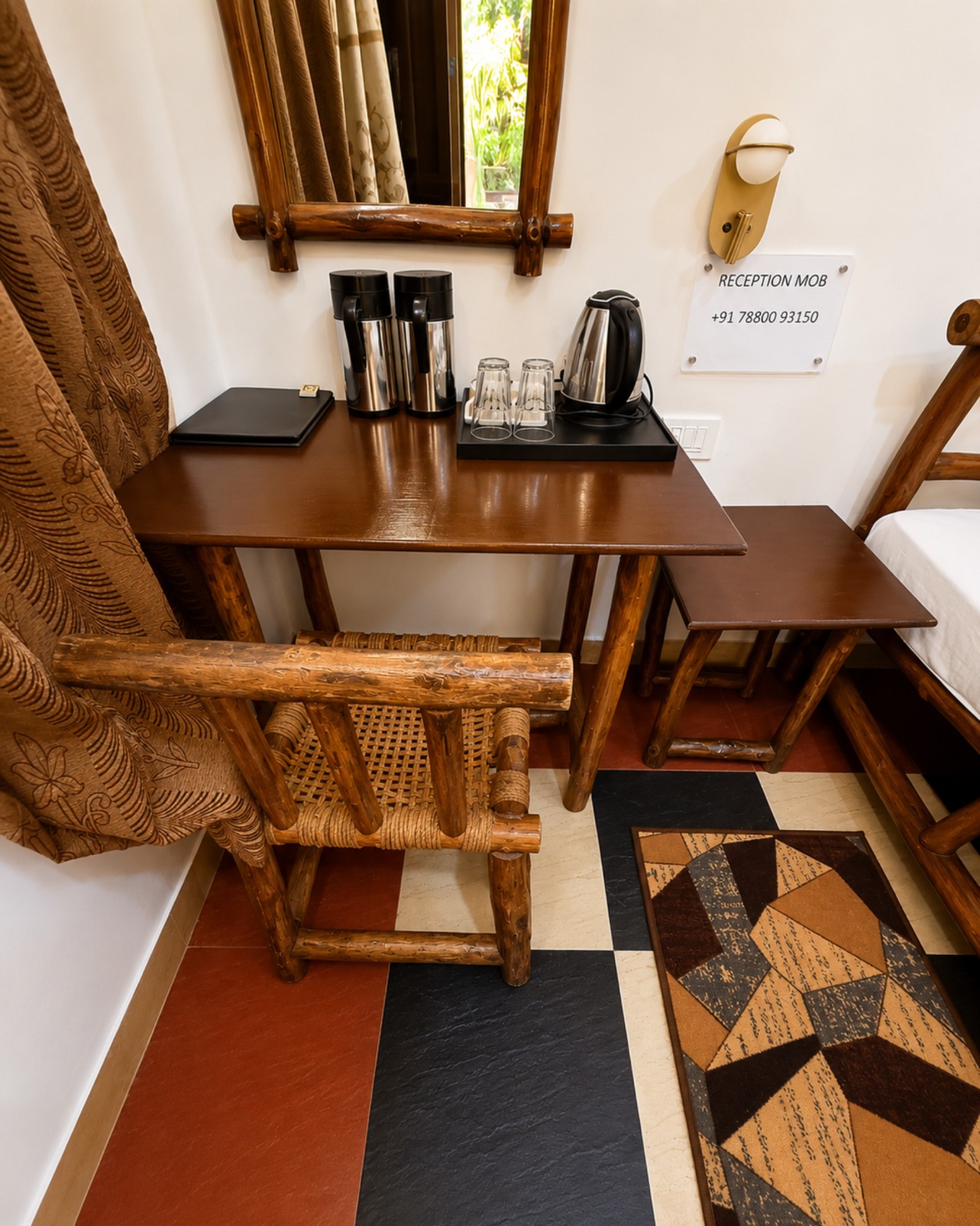 Room refreshments and wooden furniture at Mahua Tiger Resort Kanha